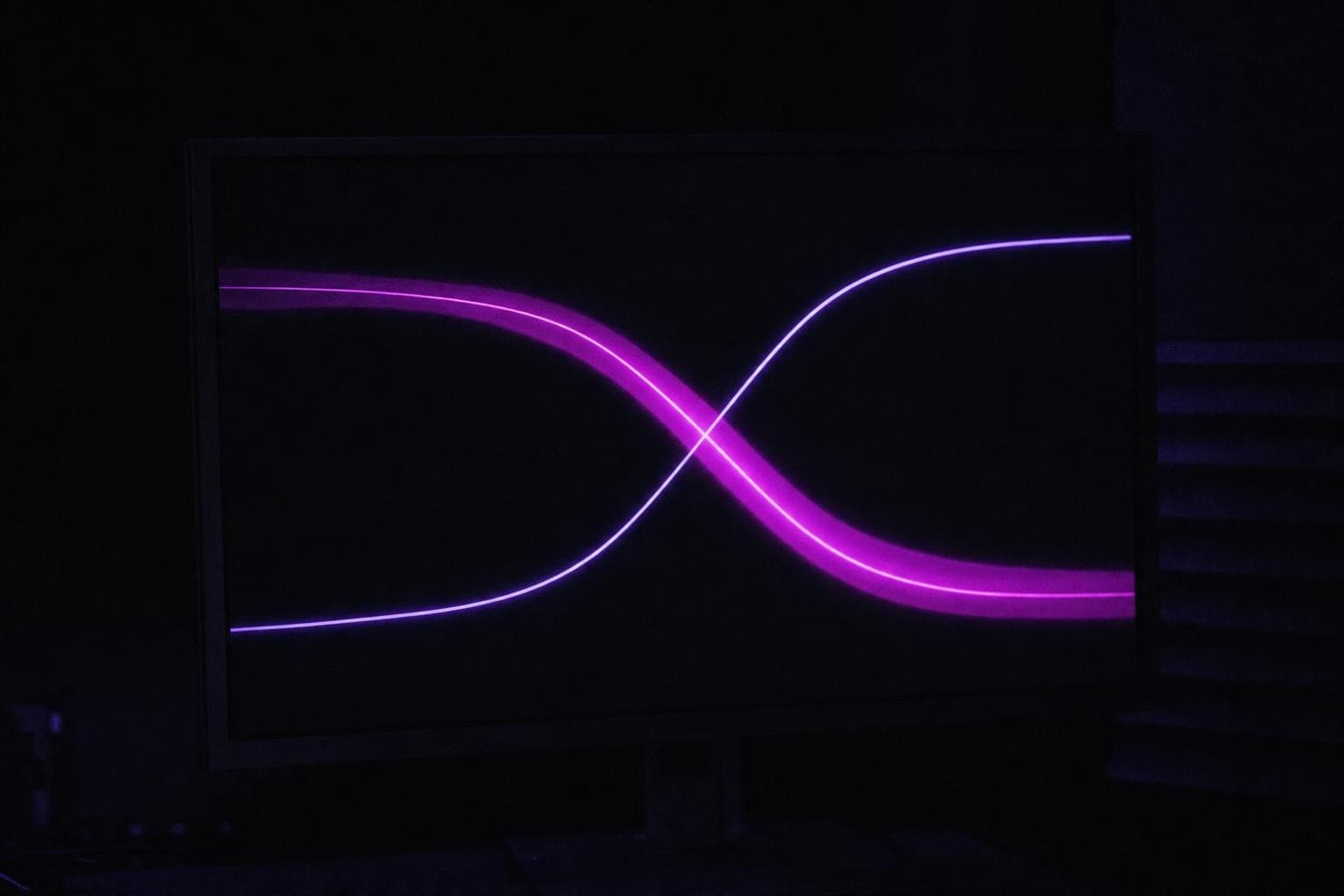 A dark monitor in a recording booth glowing with two smooth cumulative curves crossing near the centre, a Tippett plot, one curve wrapped in a softly glowing magenta credible-interval band, the only light in the frame.